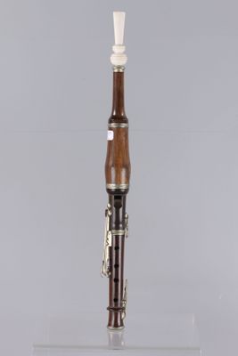 an image of a musical instrument on a clear surface