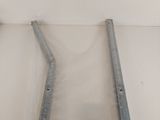 a metal ladder that is attached to a wall