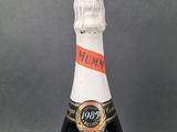 an old bottle of champagne with a label on it