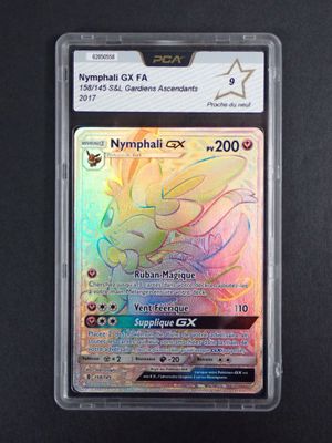a close up of a pokemon card in a plastic case