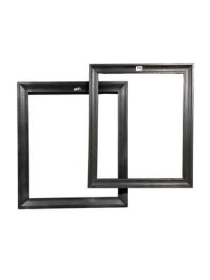two black picture frames on a white background with a white background