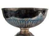 a silver bowl with a blue design on it