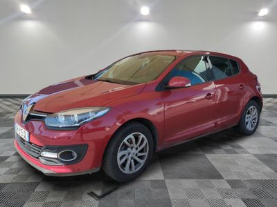 a picture of a red car parked in a garage