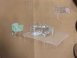 une photo d'un dessin représentant un salon, réalisé sur un morceau de carton