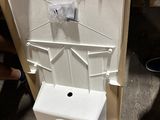 a toilet that is in the middle of a cardboard box