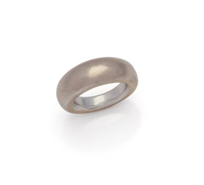 a close up of a silver ring on a white background