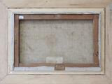 an old picture frame with a picture of a cat in it
