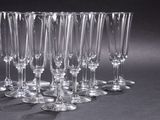 a lot of empty wine glasses sitting on a table