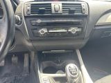 a picture of a car dashboard with a steering control