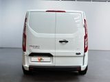 a white van that is parked in a room