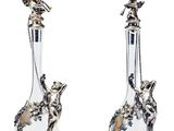 pair of silver - plated and glass decanters with birds and flowers