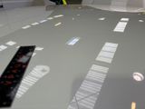 a remote control sitting on a table in a room
