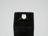 an engagement ring with a single stone in the center