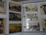 an open book with pictures on it on a table