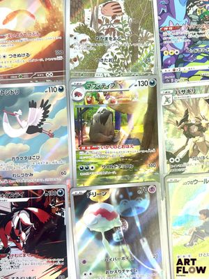 a lot of pokemon cards that are on the table