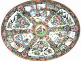 a plate that has a picture of a woman and flowers on it