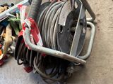 a cart that has a bunch of hoses in it