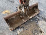 a small bulldozer that is sitting on the ground