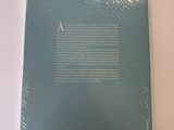 the back cover of a book with a picture of a person on a surfboard
