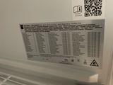 an image of a refrigerator with a sticker on the door