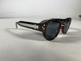 a close up of a pair of sunglasses on a table