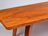a close up of a wooden table on a white background