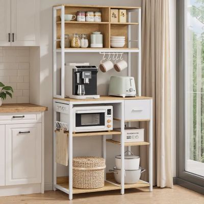 a white kitchen with a microwave, coffee maker, and shelves