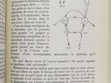 an open book with a drawing of a man ' s head on it