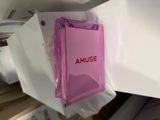 a pink purse with the word amuse on it