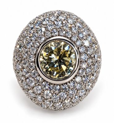 a close up of a diamond ring on a white background