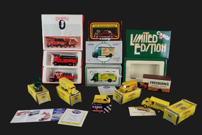 la boîte contient de nombreux types différents de petits trains et de petits camions