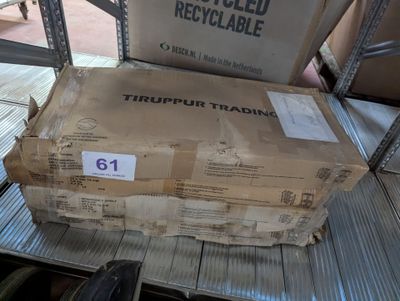 a box on a carton on a conveyor belt in a warehouse