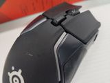 a close up of a computer mouse sitting on top of a table