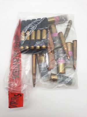 a close up of a bunch of bullet shells in a plastic bag