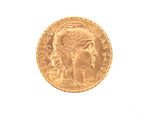 an image of a gold coin on a white surface
