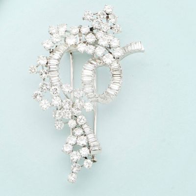 a brooch with a bunch of diamonds on it