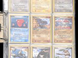 a picture of a collection of pokemon cards in a binder