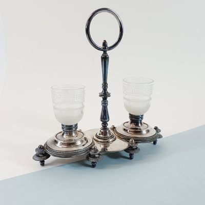 pair of antique silver plated candlesticks with glass holders