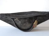 a black bag that has a zipper on it