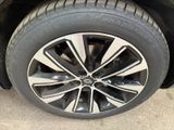 a close up view of a tire on a car