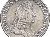 a close up of a coin with a woman ' s head on it