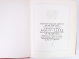 an open book with chinese writing on it on a table