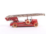 a red toy fire truck with a ladder on top of it