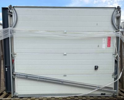a picture of a garage door with a hose attached to it
