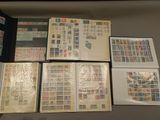 many different types of stamps on a table