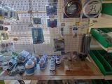 a room with many items on the shelves in it
