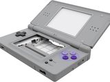an image of a gray nintendo game console with a purple controller