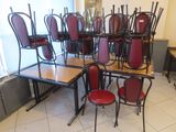many chairs and a table in a room