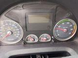 a close up of a car dashboard with a speedometer