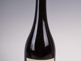 a bottle of wine that is sitting on a table